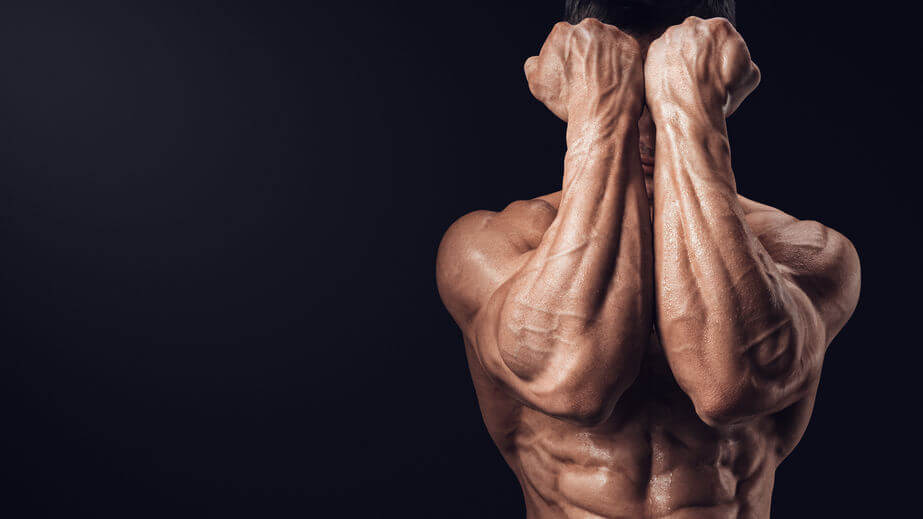 Athlete showing his grip strength and forearm muscles